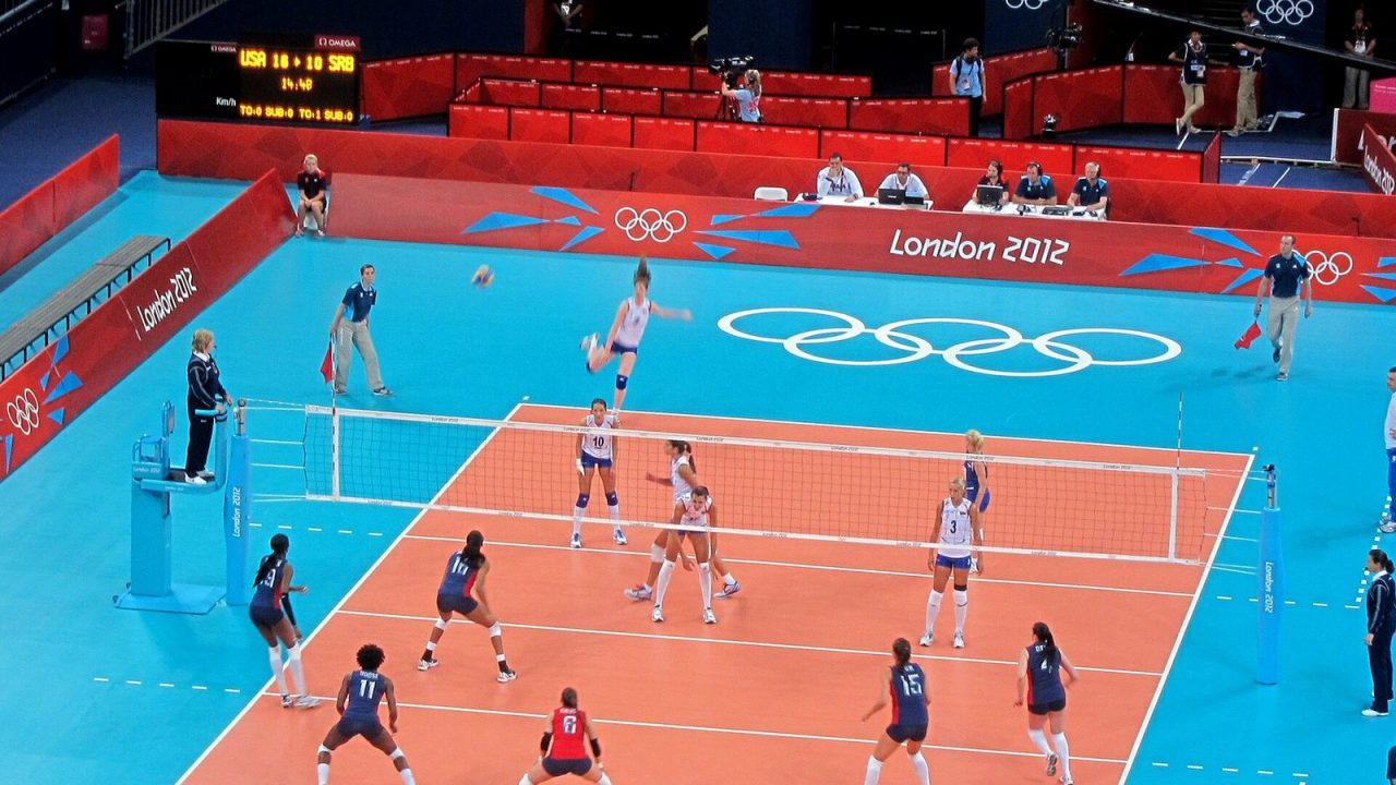 Wide view of the USA and Serbia women in formation on court at the London 2012 Olympics
